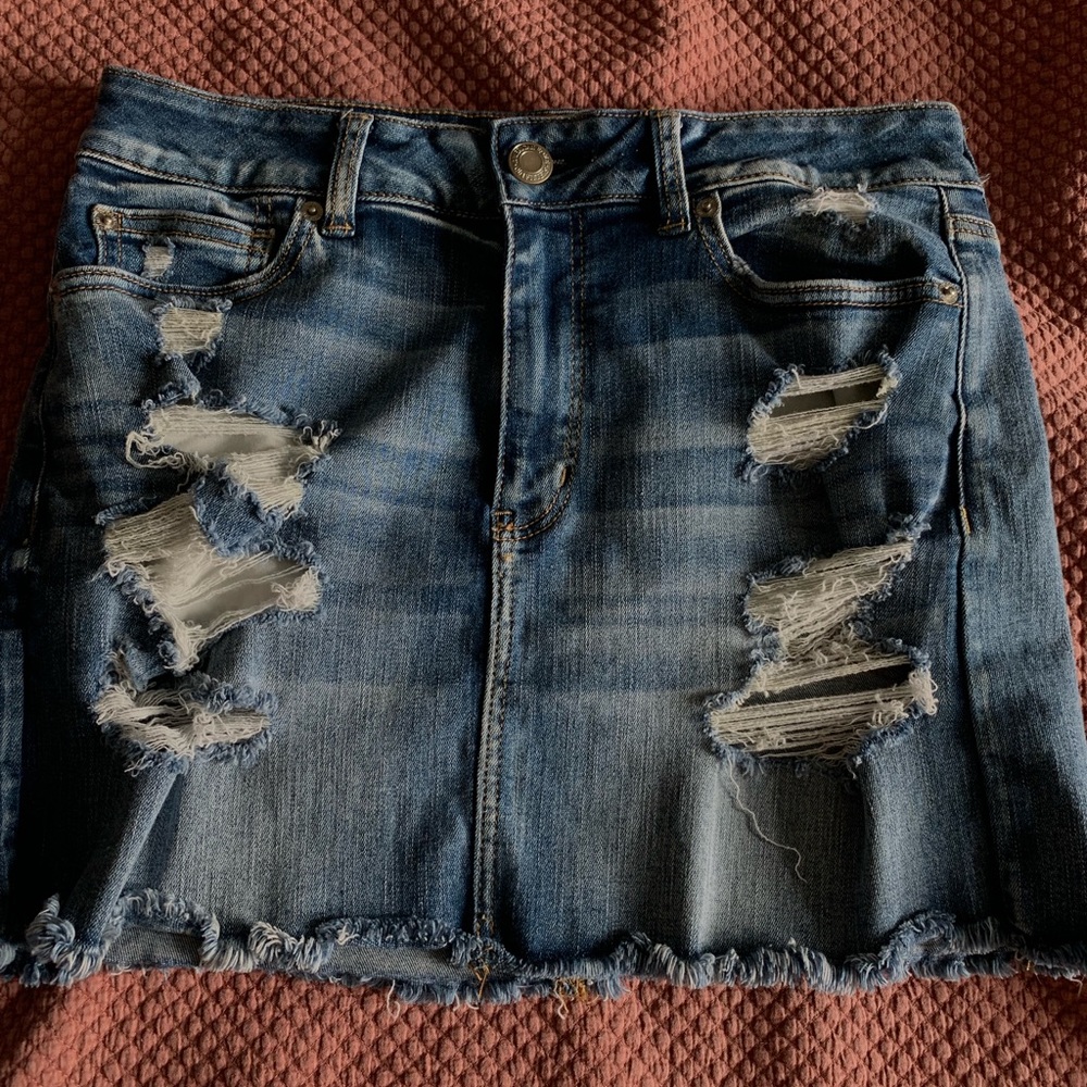American Eagle distressed high rise jean skirt